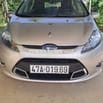 Ford Fiesta ghi vàng,122371 km