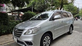 Cần bán Innova E (2.0L) 2015MT, màu bạc, gđ sử dụng mới 95%.