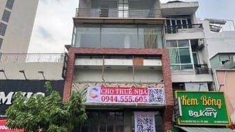 Cho thuê nhà 214Bis Nguyễn Trãi, Quận 1 - DT 6.8x9m, trệt lửng 3 lầu