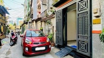 Nhà đường 5m Thông Bùi Quang Là F12 GV. 3.5x14 Trệt 2 lầu sân thượng