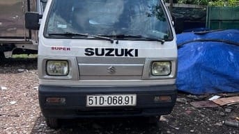Bán tải SUZUKI CARRY van  580 kg màu trắng đời 2016  chạy giờ cầm 