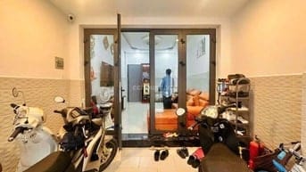 Nhà HXH Huỳnh Văn Bánh, P13, PN. DT 3.5x14m, 4 tầng