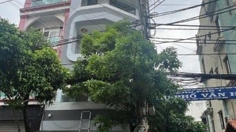 Nhà 6 tầng thang máy góc 2MT Ni Sư Huỳnh Liên Tân Bình giá 14.8 tỷ