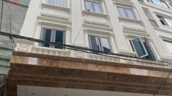 CC cần bán nhà mới 9 tầng 2 mặt ngõ ô tô .61m2 MT 5m