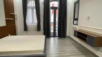 Nhà xây 4 tầng - sân để 2 ô tô - đường Lê Quang Định P 7 Bình Thạnh