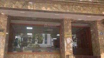 BÁN TÒA NHÀ 9 TẦNG PHỐ NGHĨA TÂN – THANG MÁY – HẦM Ô TÔ – KINH DOANH 
