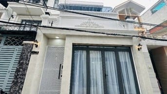 NHÀ 3 Lầu DT:6,2x22m, DT: THU NHẬP 80 triệu/tháng, xe hơi Lê Văn Thọ
