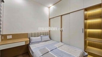 NHÀ TÂN UYÊN, BD 105m2 1tret 2lầu. Gần chợ ông đông,  giá 1ti4