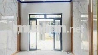 Căn nhà lầu trệt đồng sở hữu sân ô tô tại chợ Tân Phước khánh BD (củ)
