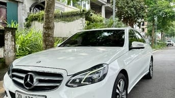Bán Mercedes E250 2014 W212 màu trắng nội thất vang đỏ