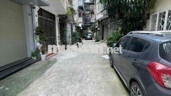 Bán nhà tập thể phố giải phóng oto đỗ cửa nhà đẹp 2 thoáng 80m T3 giá