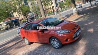 Ford Fiesta 2011 màu cam đỏ đã lăn bánh