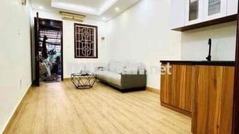Bán nhà tập thể phố Lê Gia Định nhà đẹp 3 thoáng oto đỗ chân cầu thang