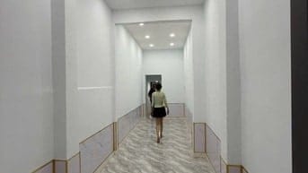 Nhà bán Trần Hưng Đạo (2 x 12) 2 tầng + lửng - Quận 1