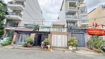 BÁN NHÀ MẶT TIỀN 4m X 21m CƯ XÁ NGÂN HÀNG QUẬN 7