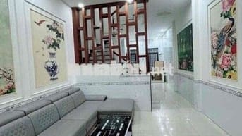 nhà lầu trệt TÂN PHƯỚC KHÁNH,2p ngủ,có nội thất,đường 7m đậu ô tô ok