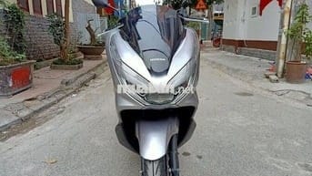 Xe máy Honda PCX màu bạc đã sử dụng