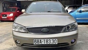 Ford Laser Vàng cát Số sàn