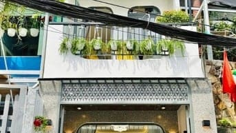 Bán nhà mới mặt tiền kinh doanh- Gần Công Viên Gia Định