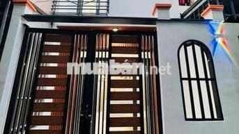 bán nhà 1 trệt 1 lầu giá rẻ vừa hoàn thiện kdc đông đúc mới 100%