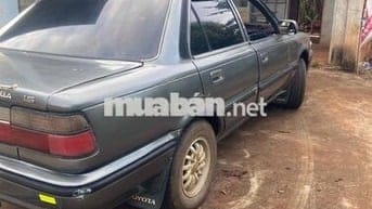 toi cần bán xe Toyota Corolla 1989 - 245000 km
