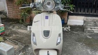 Piaggio Vespa V3 2014 màu Kem