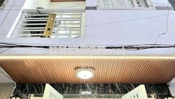 Cần bán nhà đường trước nhà 4 m nhà có sổ hồng