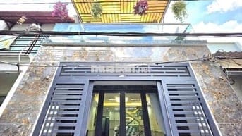 Nhà đẹp vào ở liền đường xe hơi gần Phú Mỹ Hưng quận 7