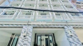 Nhà có cầu thang máy 4 x 20 có 4 tầng 8pn 8wc sân thượng