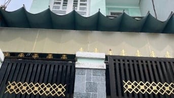 BÁN NHÀ ,hẻm 1283 ,htp .Q7- dt- 4x17.5 đúc 2 tầng ốp máy ,