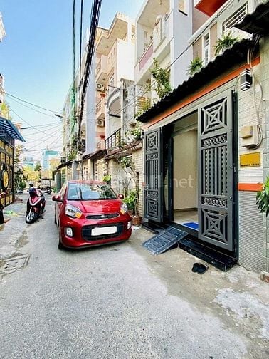 Nhà đường 5m Thông Bùi Quang Là F12 GV. 3.5x14 Trệt 2 lầu sân thượng
