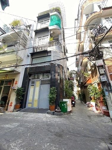Góc Hẻm xe hơi Phan Văn Trị gần Ng Trãi,Ngang 4,05m 6Tầng,11PN,Nở Hậu