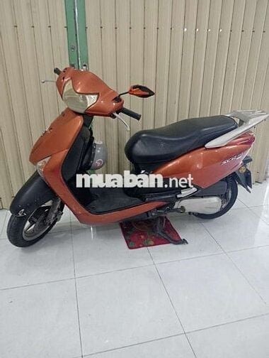 Về quê gấp cần bán xe Honda Fi phun xăng điện tử