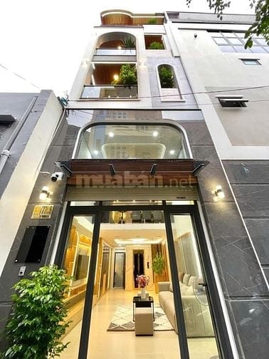 Nhà 4 x 11 đúc 1 lững 4 lầu có thang máy quang trung p11 gò vấp 