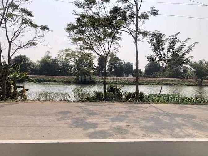 Bán 1.279m2 đất 2 MT sông Vàm Cỏ Tây và đường liên huyện thị trấn Mộc 