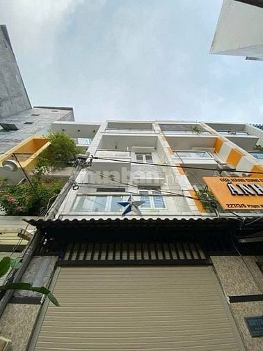 Cho thuê nhà nguyên căn 1 trệt 3 lầu, hẻm xe hơi đường Phạm Văn Chiêu