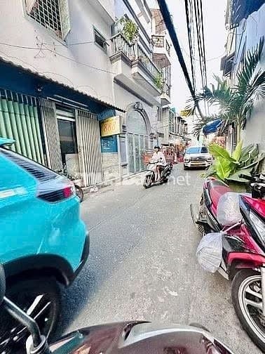 NHÀ BÙI ĐÌNH TÚY - 4.5 X 14M - XÂY 2 TẦNG - Ô TÔ ĐẬU TRONG NHÀ.