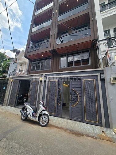 Nhà mới xây 100% HXH 11,3 tỷ, 70m2, 6PN, 7WC, 6 tầng, thang máy ở Nguy