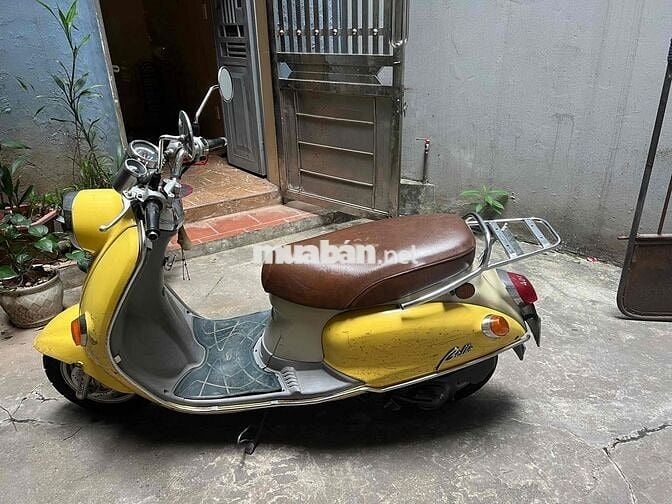 xe máy Suzuki bella vàng