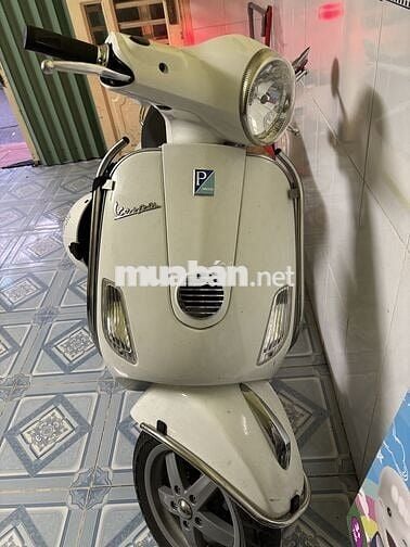 Bán xe vespa màu trắng, bs thành phố, nữ chạy