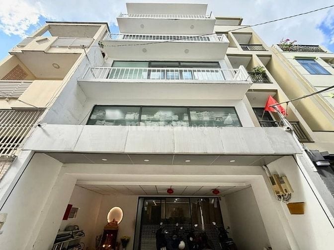 TOÀ VĂN PHÒNG " HUỲNH VĂN BÁNH" 103m2 ( 7x15m ) 5 TẦNG THUÊ 75TRIỆU