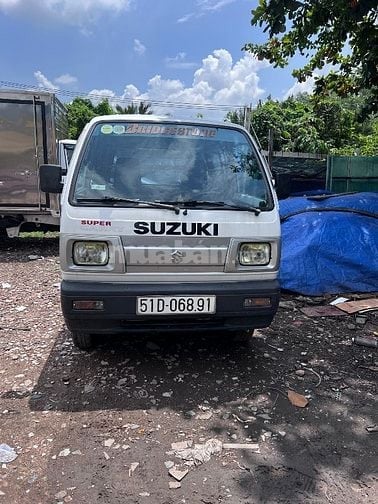 Bán tải SUZUKI CARRY van  580 kg màu trắng đời 2016  chạy giờ cầm 