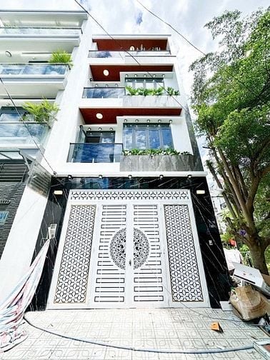 HOT.  BÁN NHÀ PHỐ MỚI XÂY 5x14 - 4 TẦNG - GARA OTO - 9T2 -GIÁP Q7 1KM