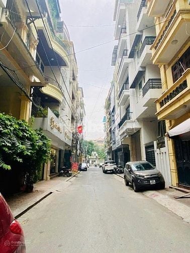 Bán nhà mặt ngõ phố Văn Cao: DT 105m2, MT 8m, 5Tầng, ngõ ÔTô,Gía 33 Tỷ