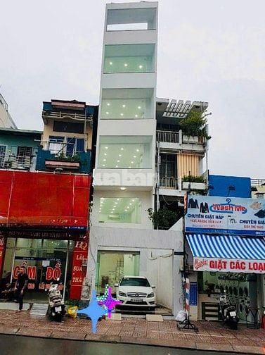 Cho thuê tòa nhà mặt tiền đường Nơ Trang Long CT TM giữa nhà