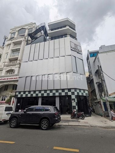 Toà nhà góc 2MT Trần Nhật Duật quận 1 (8x16m) Hầm 7 Tầng, HDT 300 tr