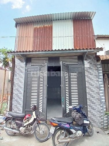 Bán nhà DT: 4X12m gồm trệt lửng 2pn ,1w phòng khách rộng đường 4m bê t