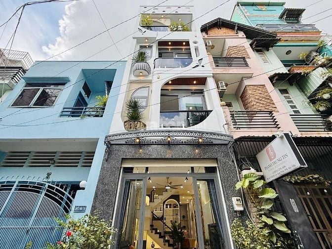 Nhà tuyệt đẹp 4 Lầu CAO CẤP hẻm xe hơi Lê Văn Thọ, P9, Q.Gò Vấp, vào ở