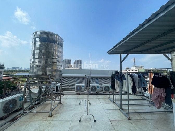 Toà nhà CHDV hầm và 4 tầng mặt đường Lê Thị Chợ Quận 7. Có 23p. 21 tỷ