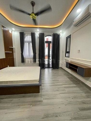 Nhà xây 4 tầng - sân để 2 ô tô - đường Lê Quang Định P 7 Bình Thạnh